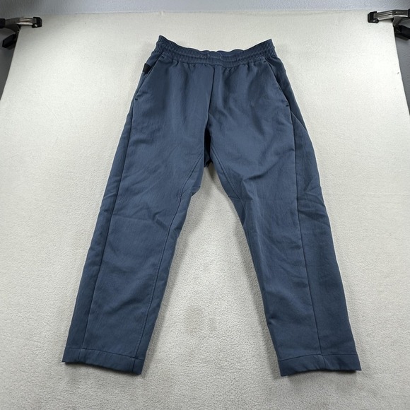 nike tech pack cropped woven pants